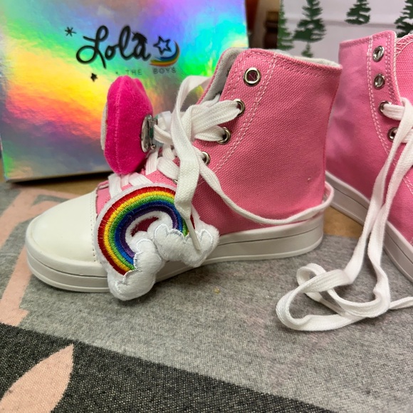 Description:
Adorable pink high-top sneakers brand new! - Picture 3 of 4